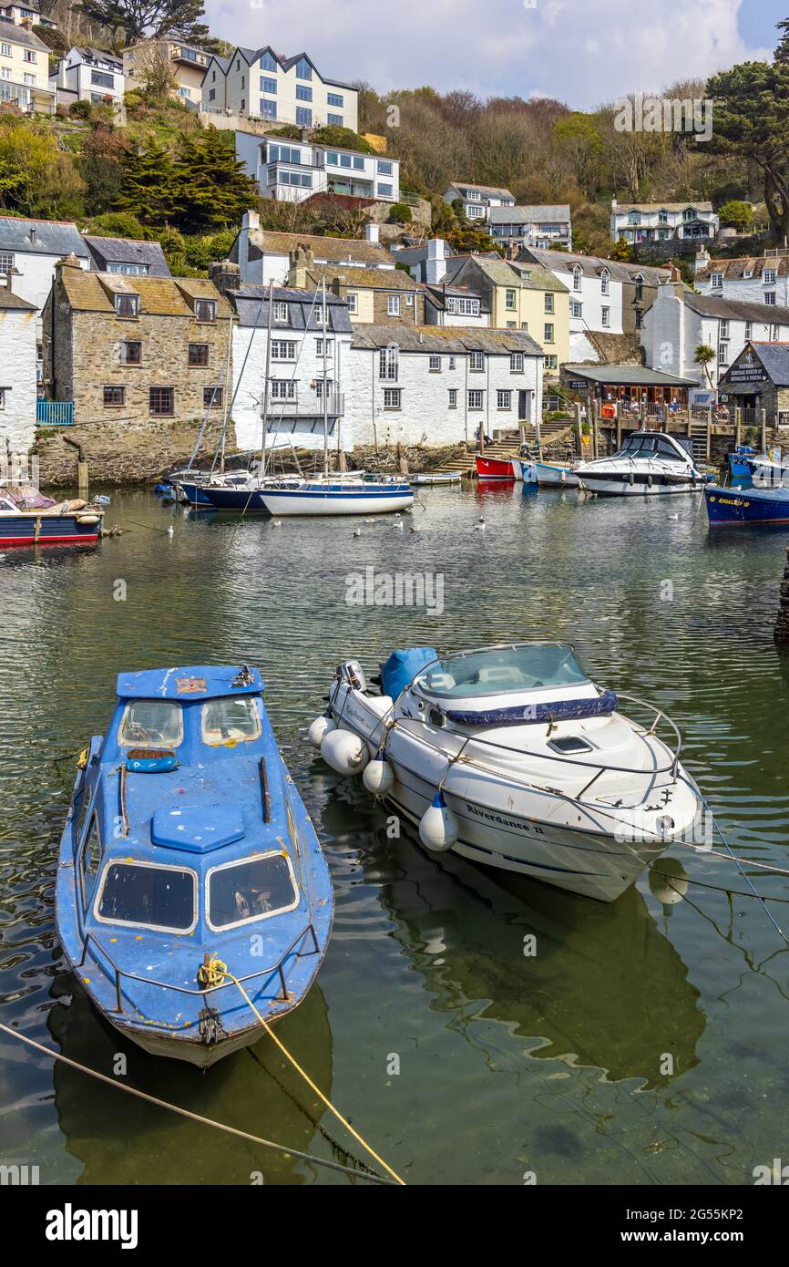 Boats moored in the inner harbour at Polperro, a charming and picturesque fishing village in south east Cornwall. Stock Photo