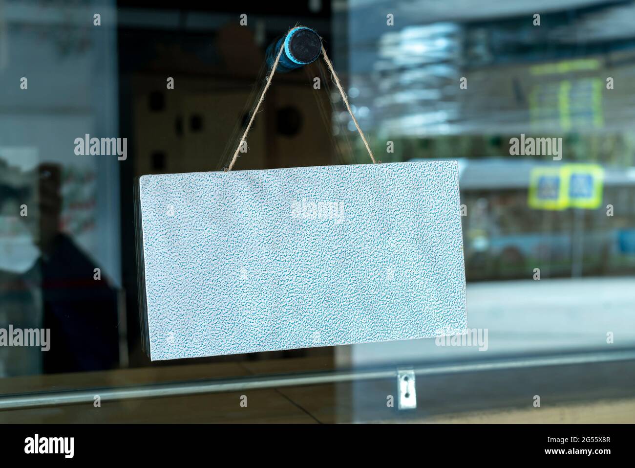 simple sign board frame hanging on the wall of the building exterior ...