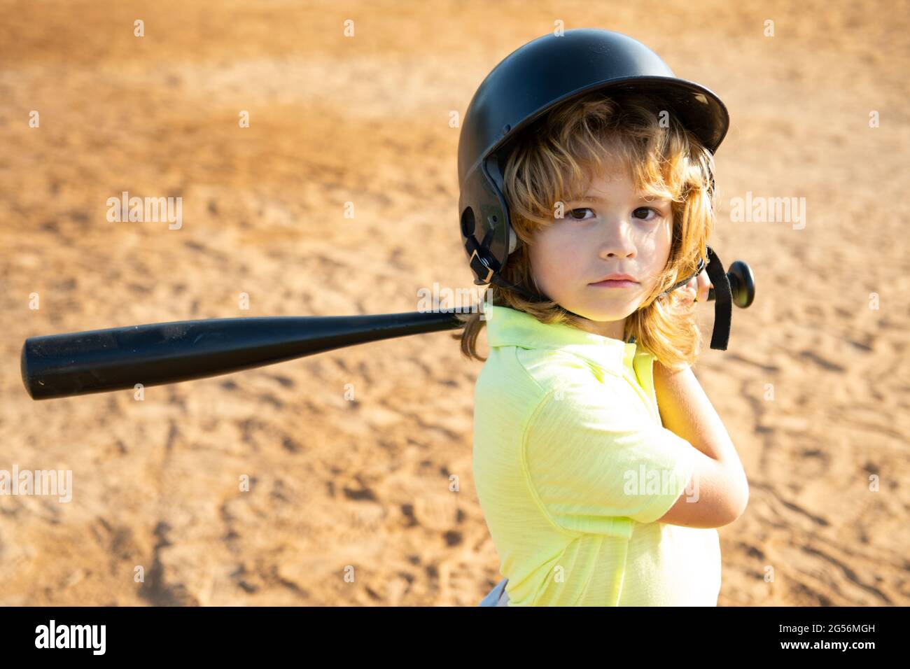 Child batter about to hit a pitch during a baseball game. Kid baseball  ready to bat Stock Photo - Alamy
