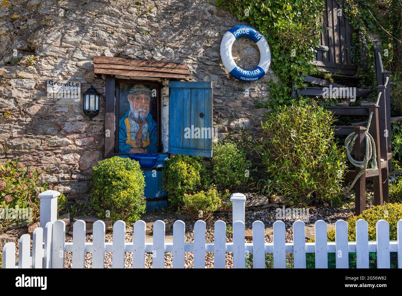 Grenville Cottage at Marina Gardens by the harbour, designed and maintained by the Pride in Brixham volunteers Stock Photo