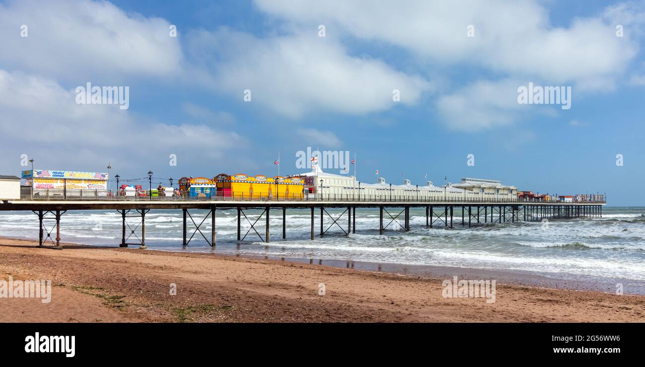 Paignton Pier in south Devon. The 780 feet pier, with its customary grand pavilion at the seaward end, first opened in 1879. Stock Photo