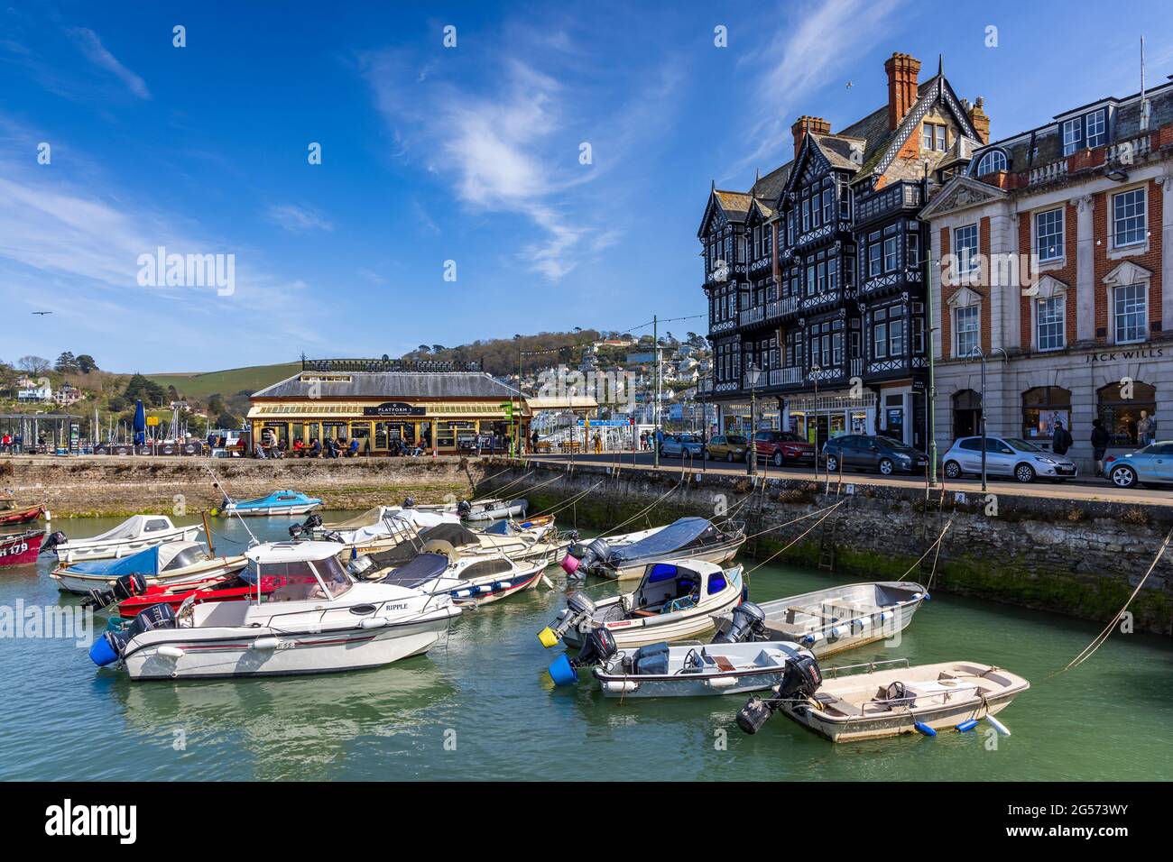 Boats moored in the lovely little square inner harbour at Dartmouth in South Devon, England. Stock Photo