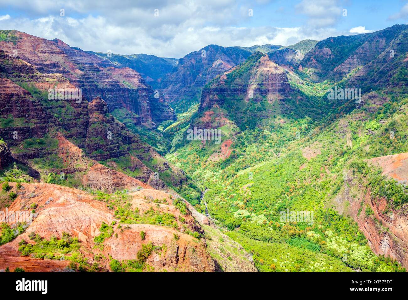 Aerial view of Waimea Canyon on the island of Kauai, Hawaii, referred to as the 'Grand Canyon of the Pacific' near Kauai's Napali Coast Stock Photo
