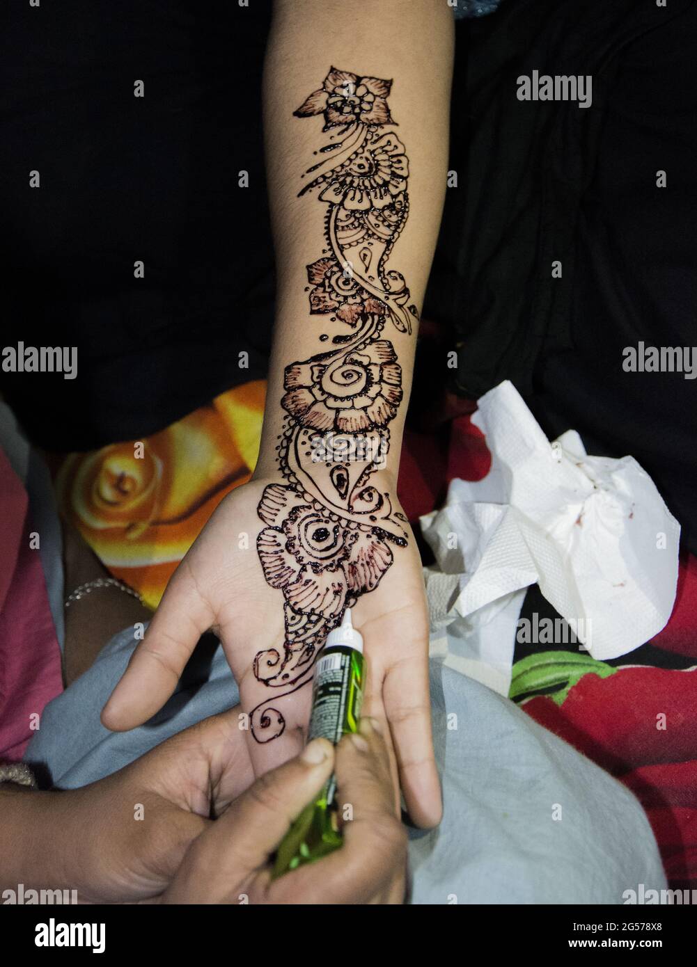 Vertical shot of a henna tattoo on a child's arm Stock Photo - Alamy
