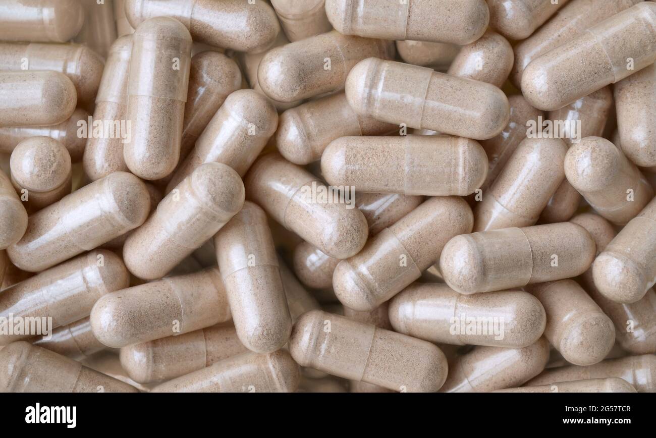 Dietary supplements in capsules for health and immunity as a background. Medications and Pills. Healthcare concept. Stock Photo