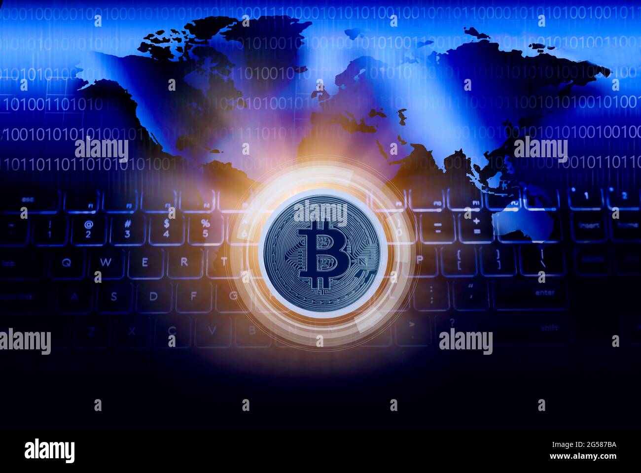 Bitcoin against World map and computer keyboard, cgi Stock Photo