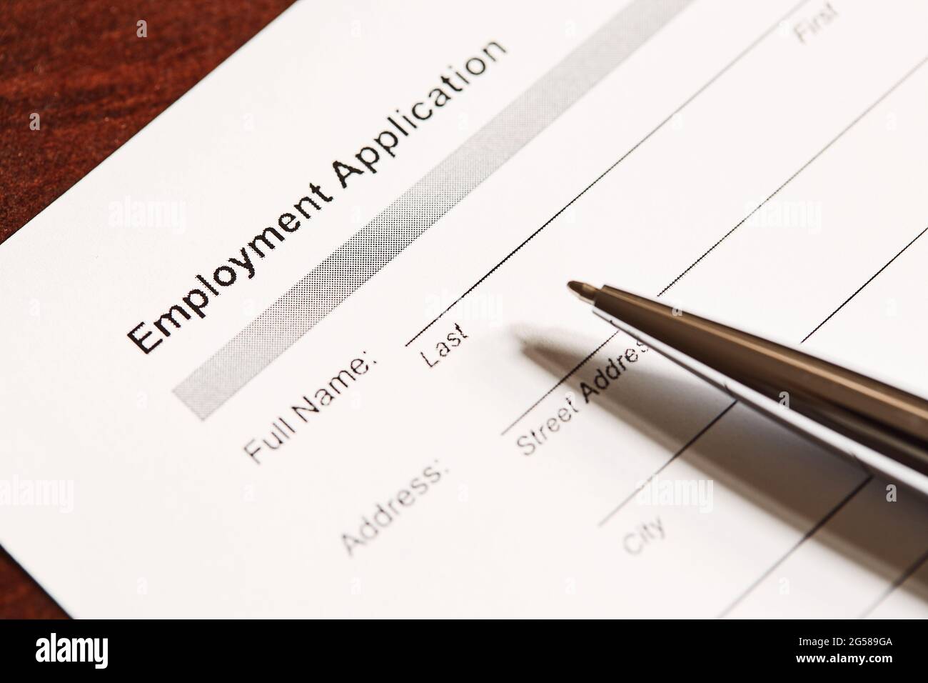 Job Application Form And Pen Stock Photo Alamy job-application-form-and-pen-stock-photo-alamy
