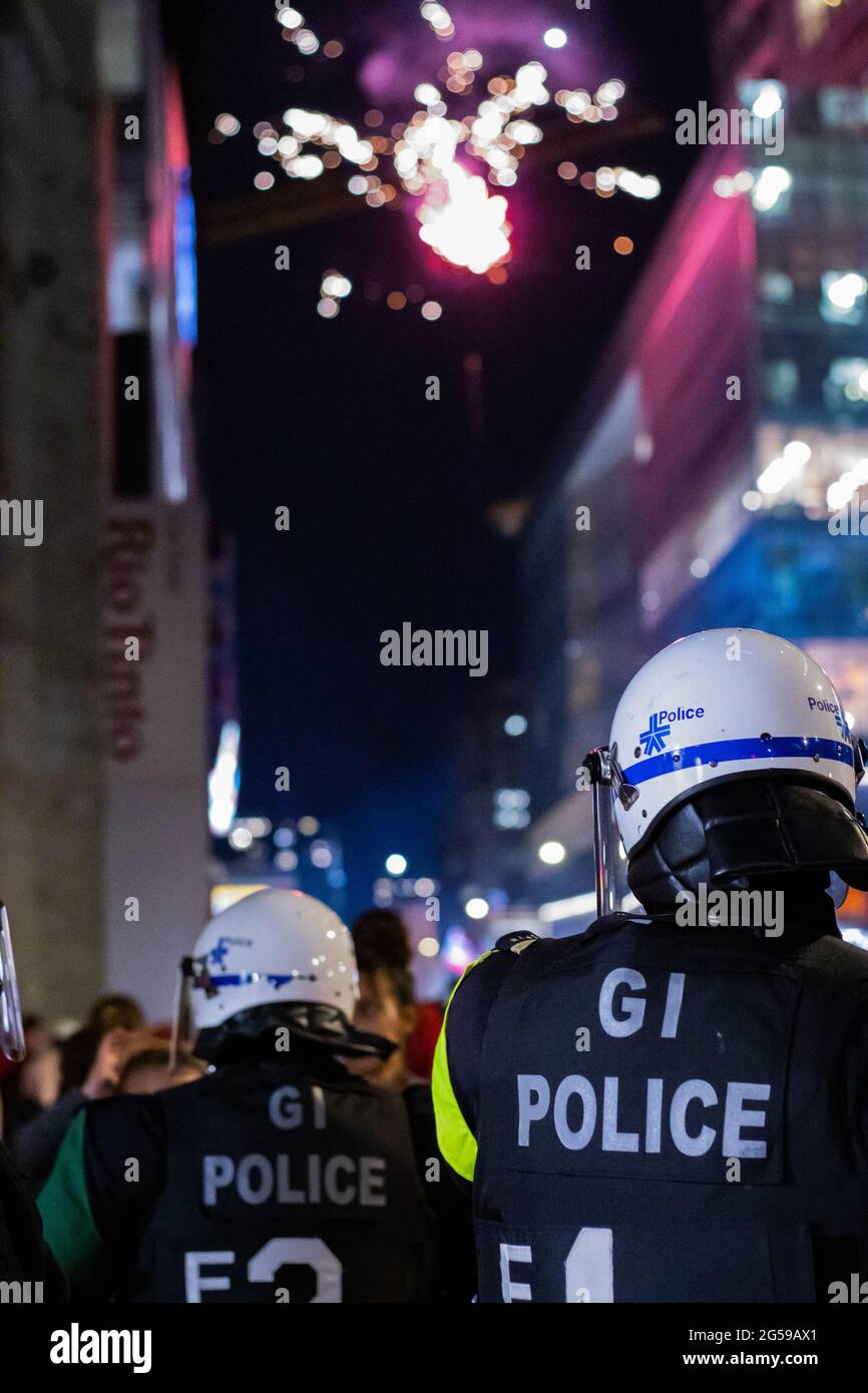 Police officers geared up and ready to intervene after the Montreal Canadiens won the semi-finals of the Stanley Cup Stock Photo