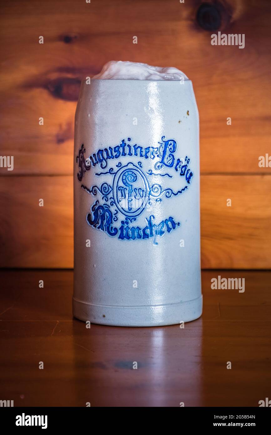 Munich, Germany - May 24 2021: Augustiner Edelstoff Bavarian Beer Liter Stein or Mug. Stock Photo