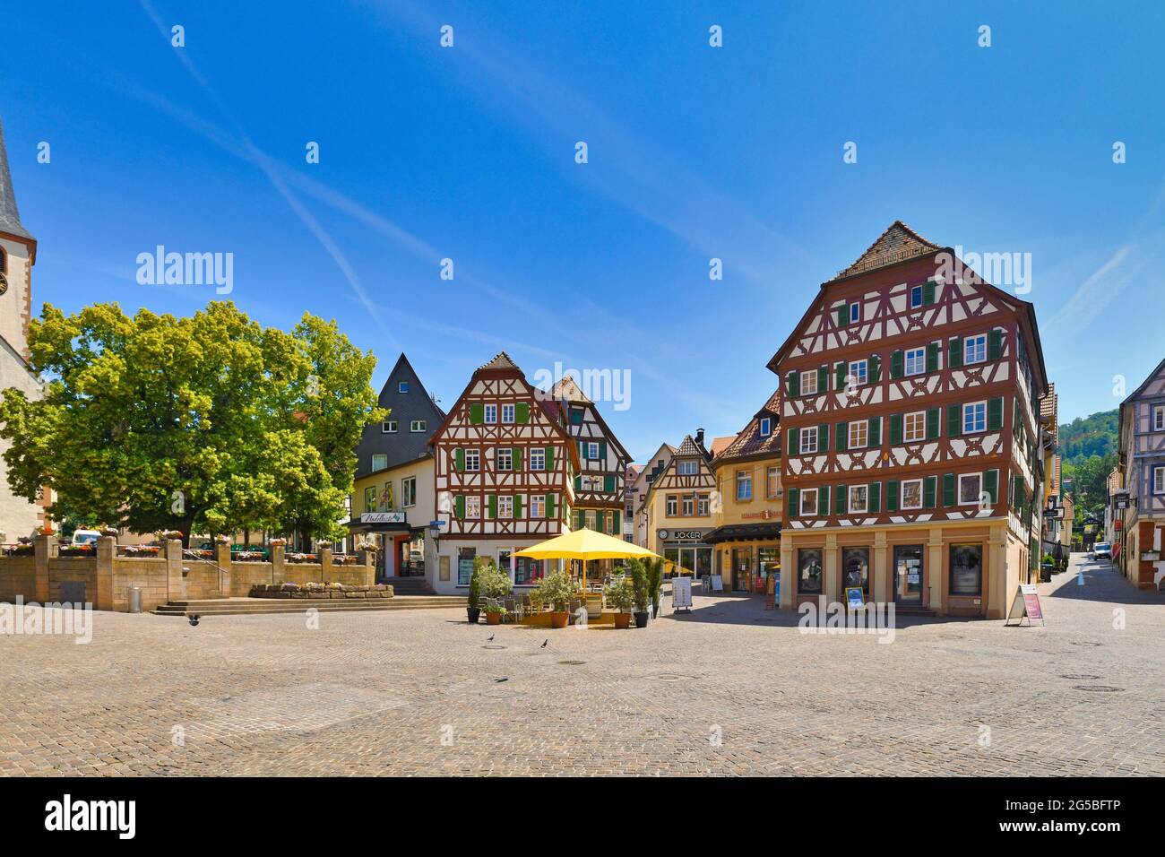 Mosbach, Germany - June 2021: Market place with beautiful historic timber-framed houses on sunny day Stock Photo