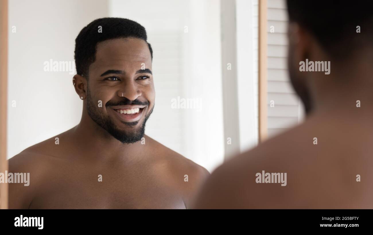 Happy attractive young African American man with facial piercing Stock Photo