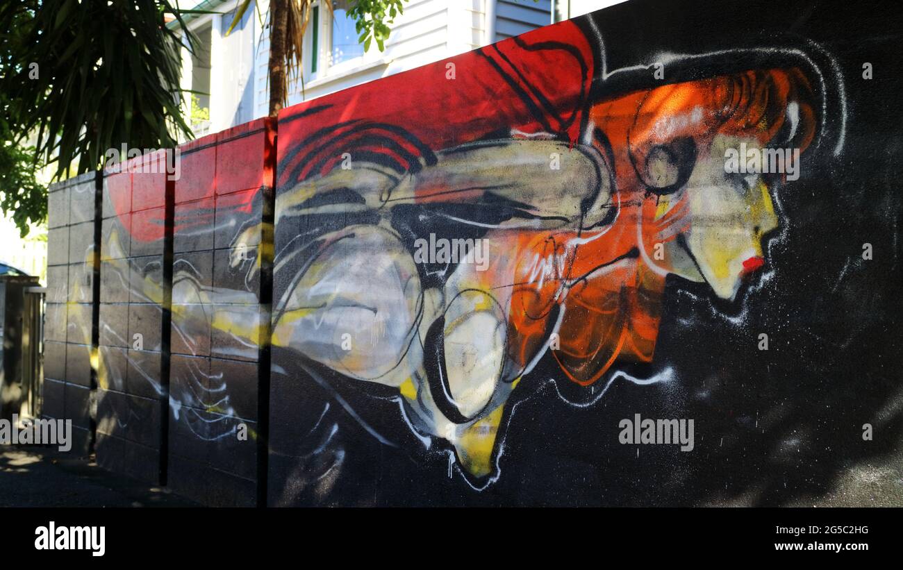 Colorful graffiti mural showing a space girl travelling through time on a suburban wall in Brisbane Australia Stock Photo