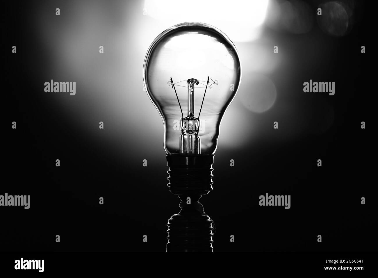 Light bulb on black background Stock Photo Alamy