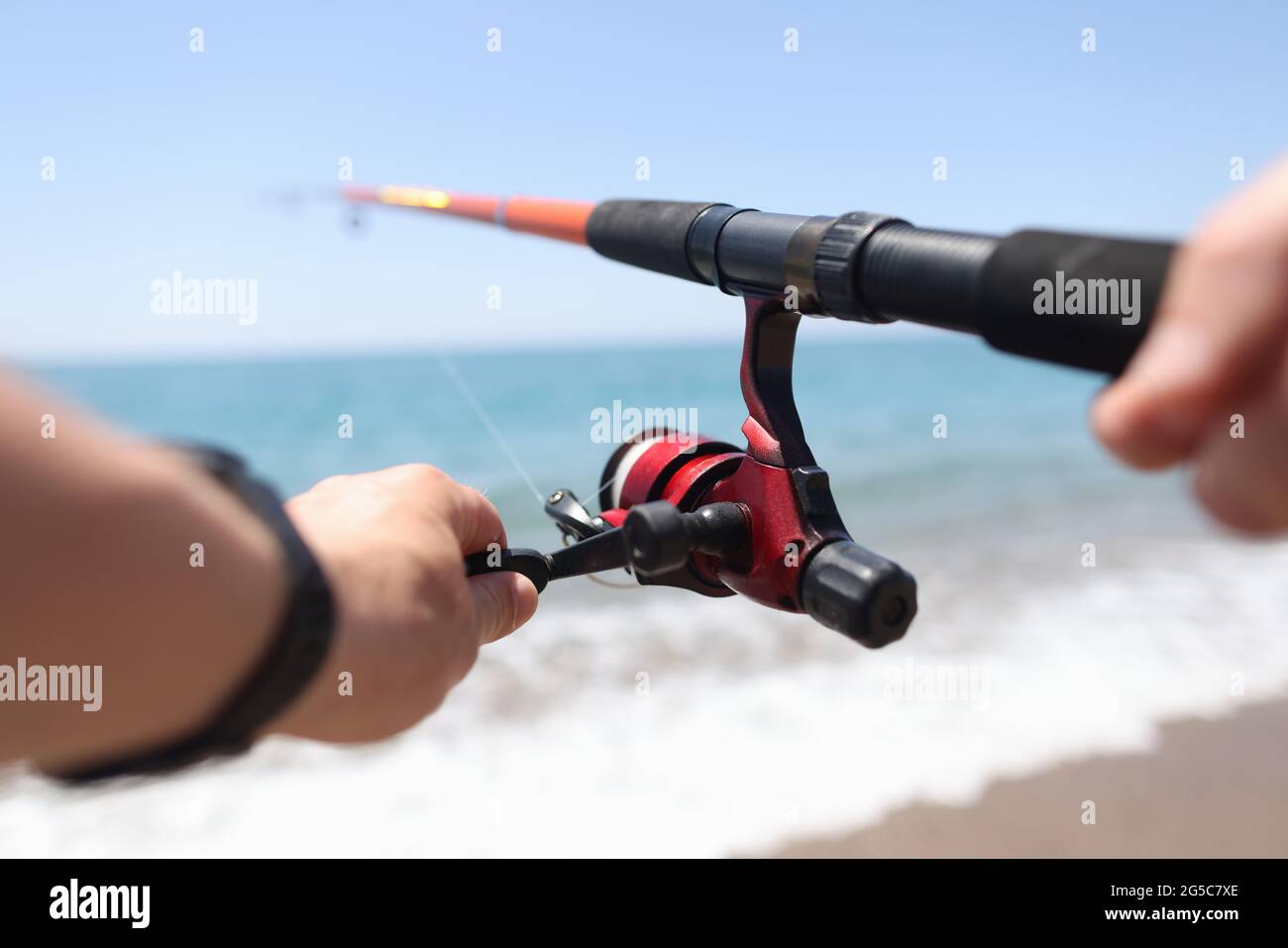 Fisherman holding fishing equipment Stock Photo by ©ljsphotography 45869421