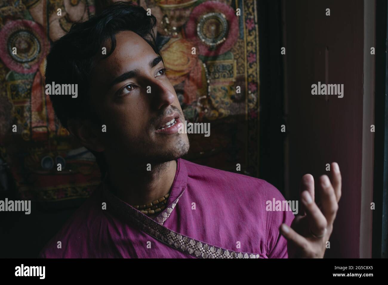 Ecuadorian young man posing inside the mandir Stock Photo