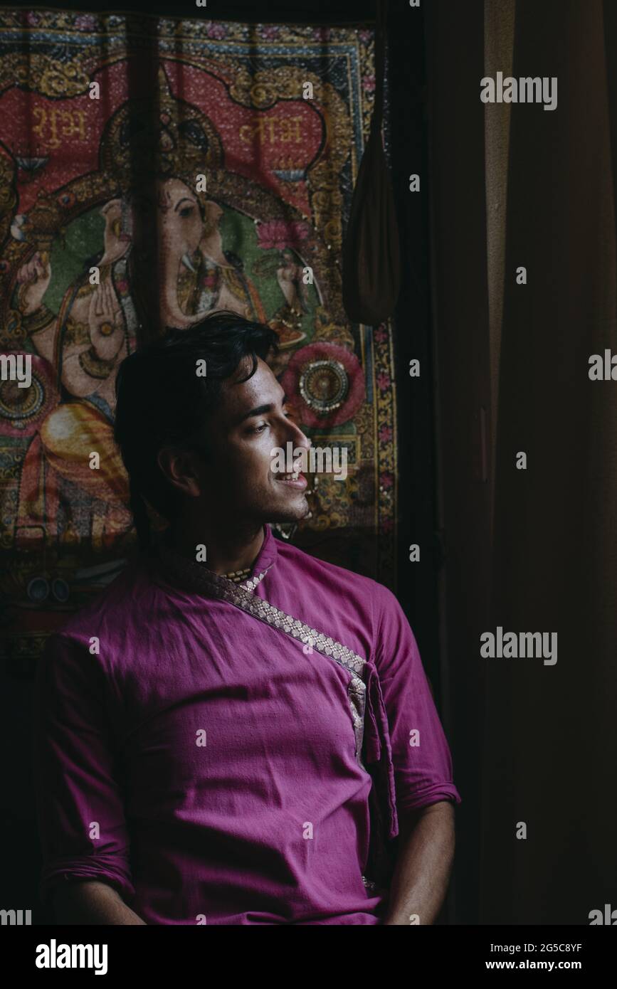 Ecuadorian young man posing inside the mandir Stock Photo