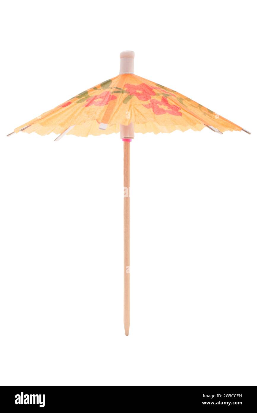 Orange cocktail umbrella on white background Stock Photo
