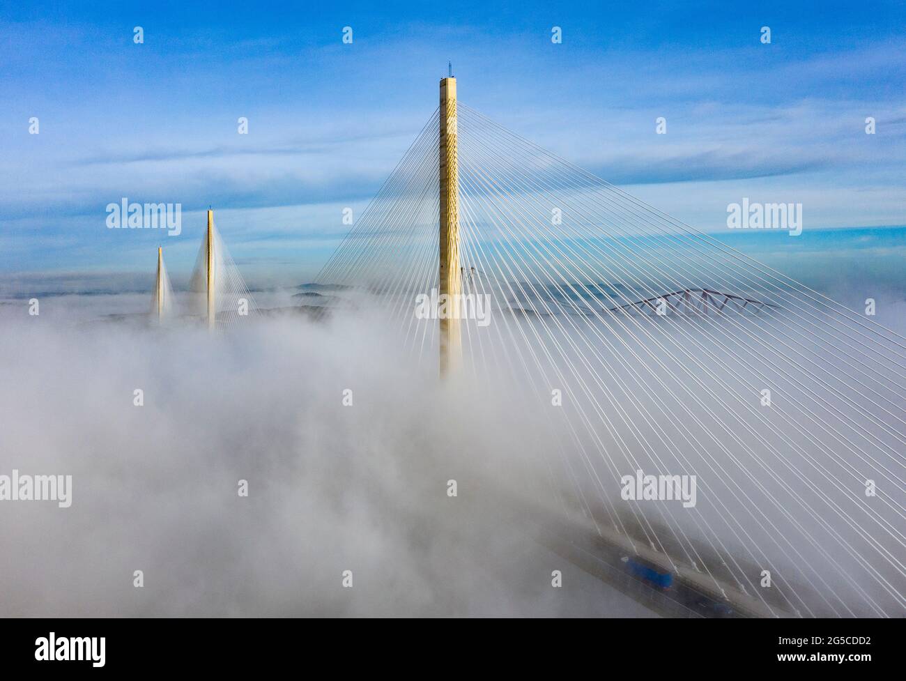 Drone image of a spectacular cloud inversion at Queensferry Crossing Bridge with lower half covered in mist, South Queensferry , Scotland, UK Stock Photo