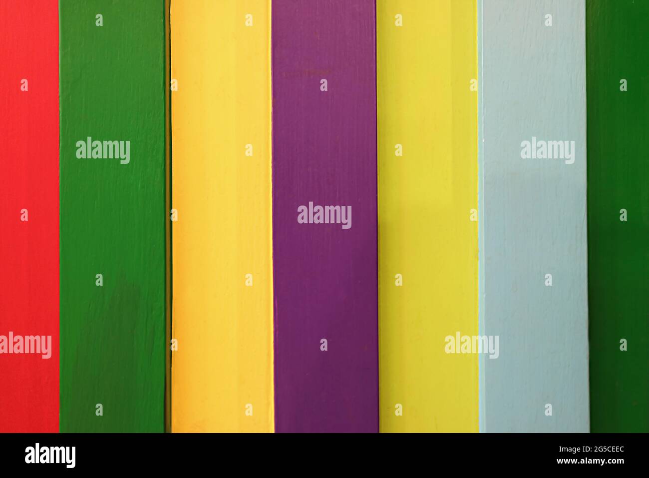 Multi-colored vertical stripes pattern wooden wall for abstract background Stock Photo