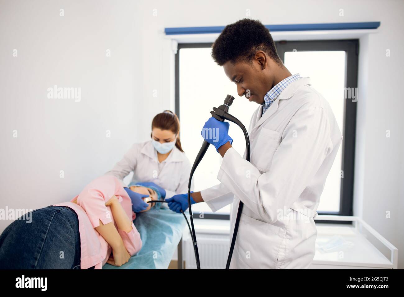 Endoscopic examination in modern medical clinic. Young confident