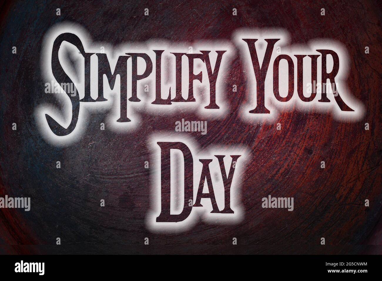 Simplify Your Day Concept text on background Stock Photo