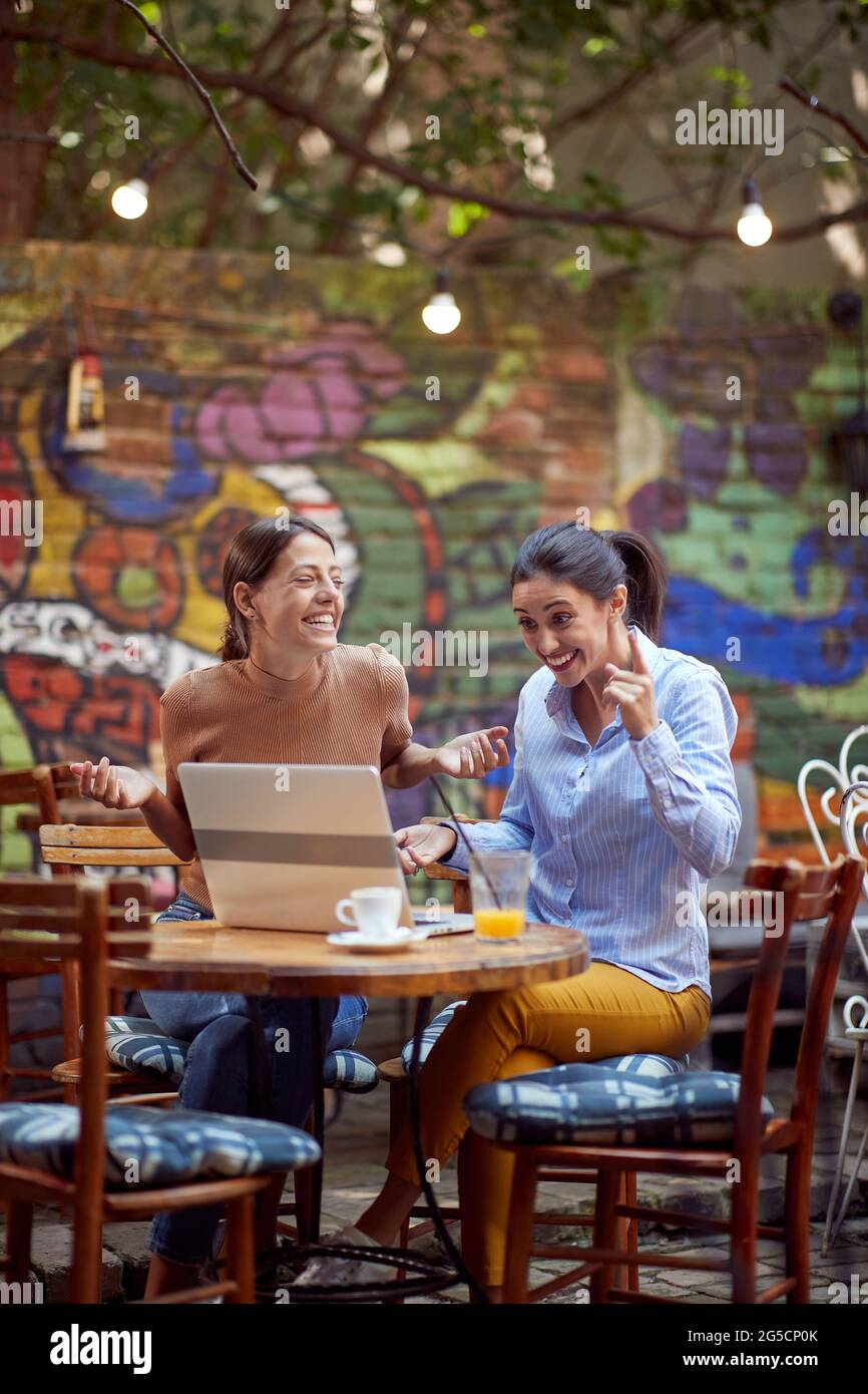 Two Male Friends Laughing In An Istanbul Cafe Stock Photo