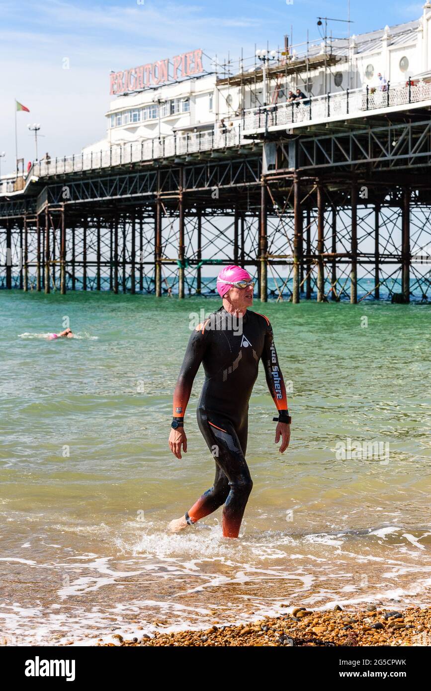 Brighton, UK. June 26th 2021 Nigel Carrian is first ashore by Brighton