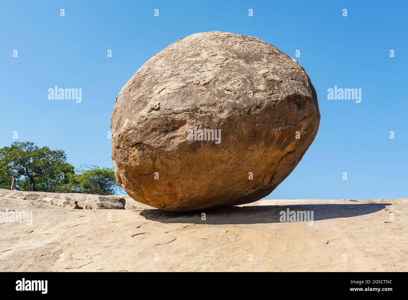 Krishna's Butter Ball, a huge boulder in Mamallapuram, Tamil Nadu, India, Asia Stock Photo