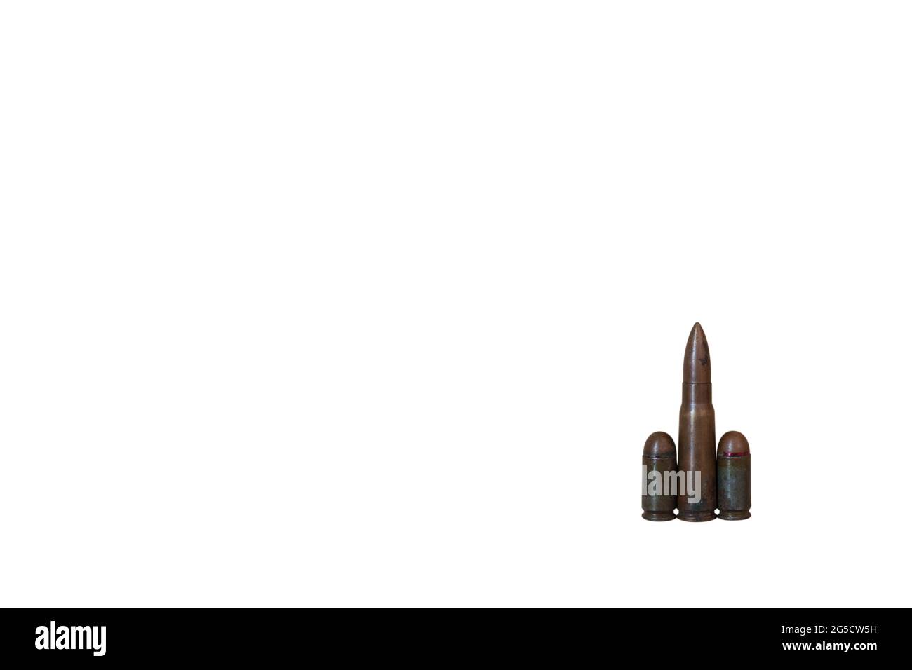 Three different caliber bullets together isolated on a white background. Bullets isolated on a white background. Military concept. Stock Photo