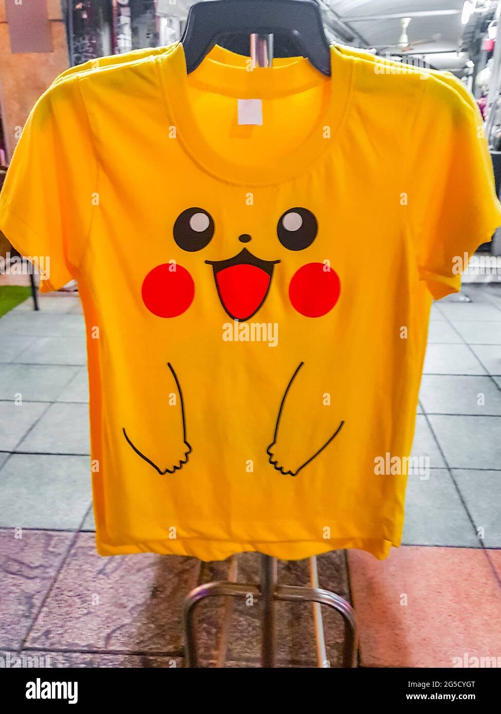Yellow funny Pikachu face Pokemon T-shirt for sale in Bangkok Thailand  Stock Photo - Alamy