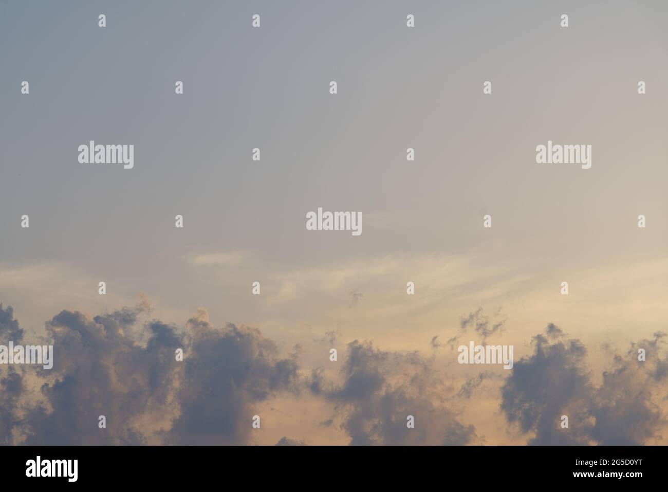 Blue sky with white and grey clouds Stock Photo - Alamy