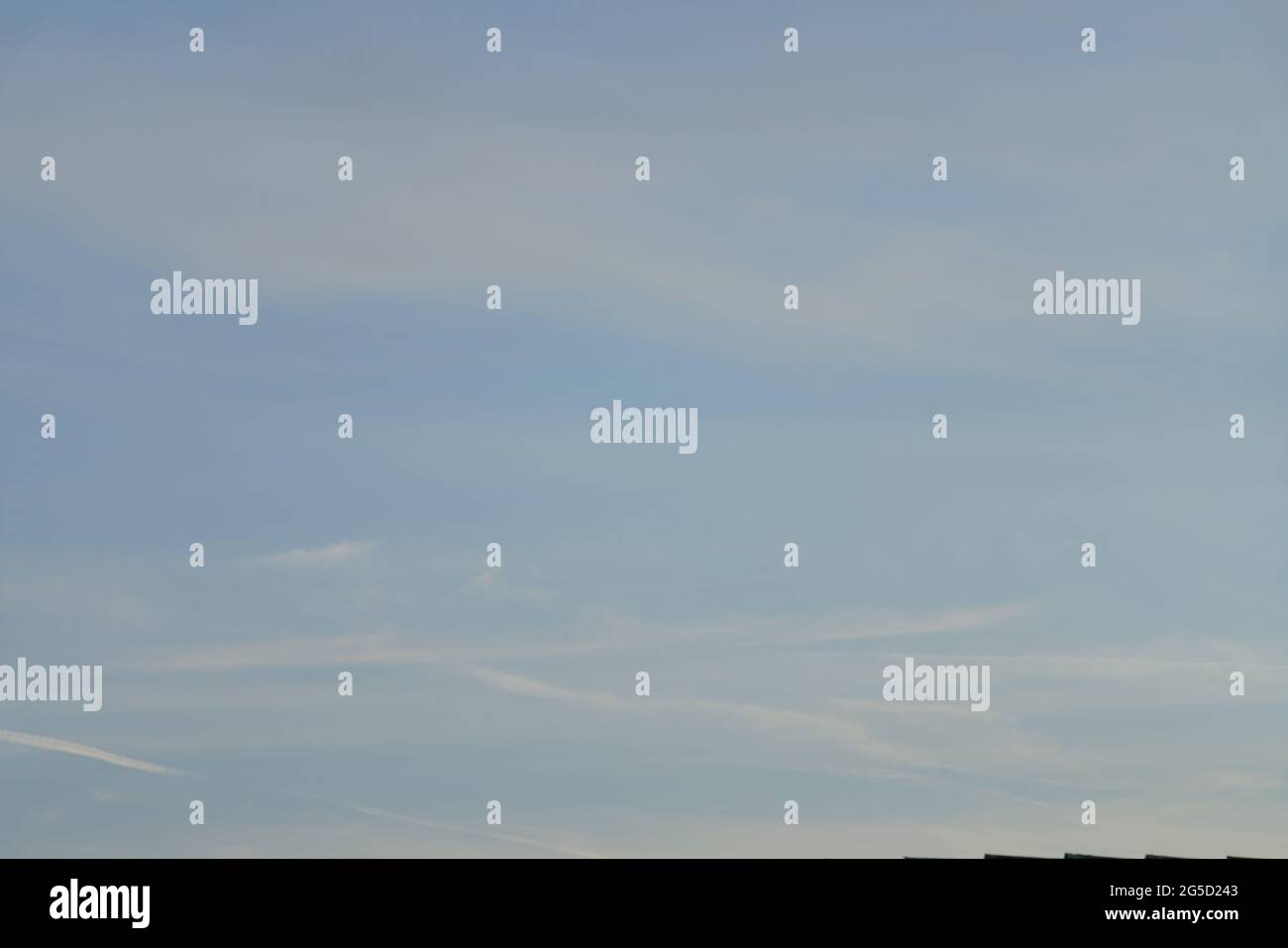 Blue sky with white and grey clouds Stock Photo - Alamy