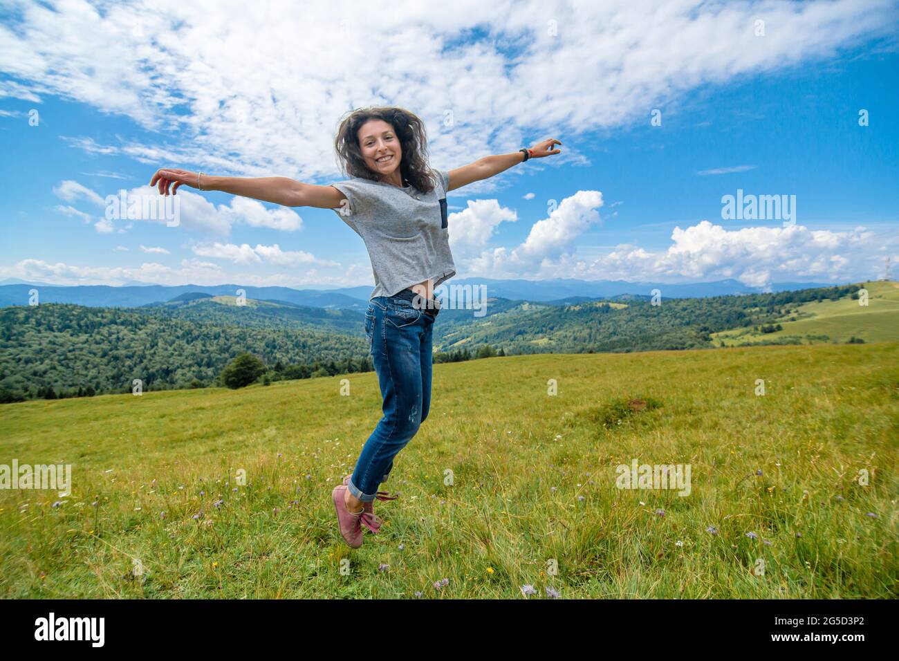 Curated visual reference: Happy Gorgeous Girl Enjoy Mountain View Jumping On The Hill Photo Inspiration