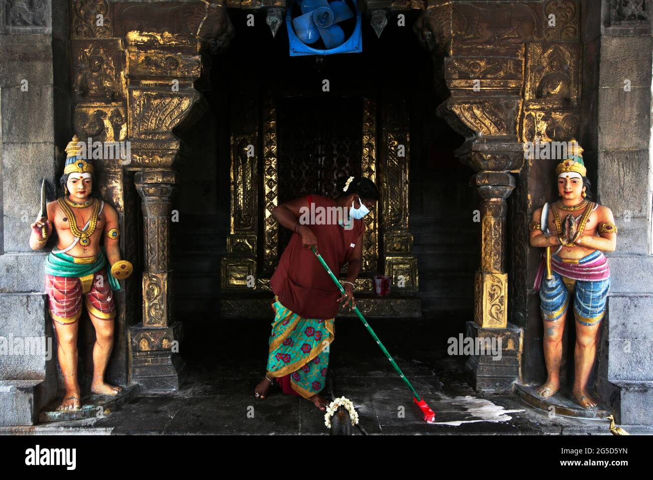 Chennai, Tamil Nadu, India. 26th June, 2021. Employees clean