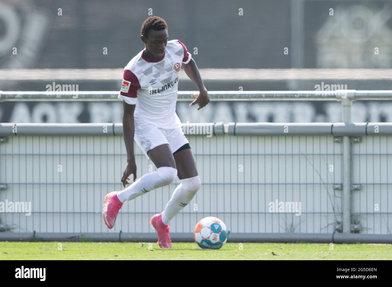Dresden, Germany. 26th June, 2021. Football: Test match, SG Dynamo - Hertha BSC II, AOK PLUS Walter-Fritzsch-Akademie. Dynamo's Meissa Diop plays the ball. Credit: Sebastian Kahnert/dpa-Zentralbild/dpa - IMPORTANT NOTE: In accordance with the regulations of the DFL Deutsche Fußball Liga and/or the DFB Deutscher Fußball-Bund, it is prohibited to use or have used photographs taken in the stadium and/or of the match in the form of sequence pictures and/or video-like photo series./dpa/Alamy Live News Stock Photo
