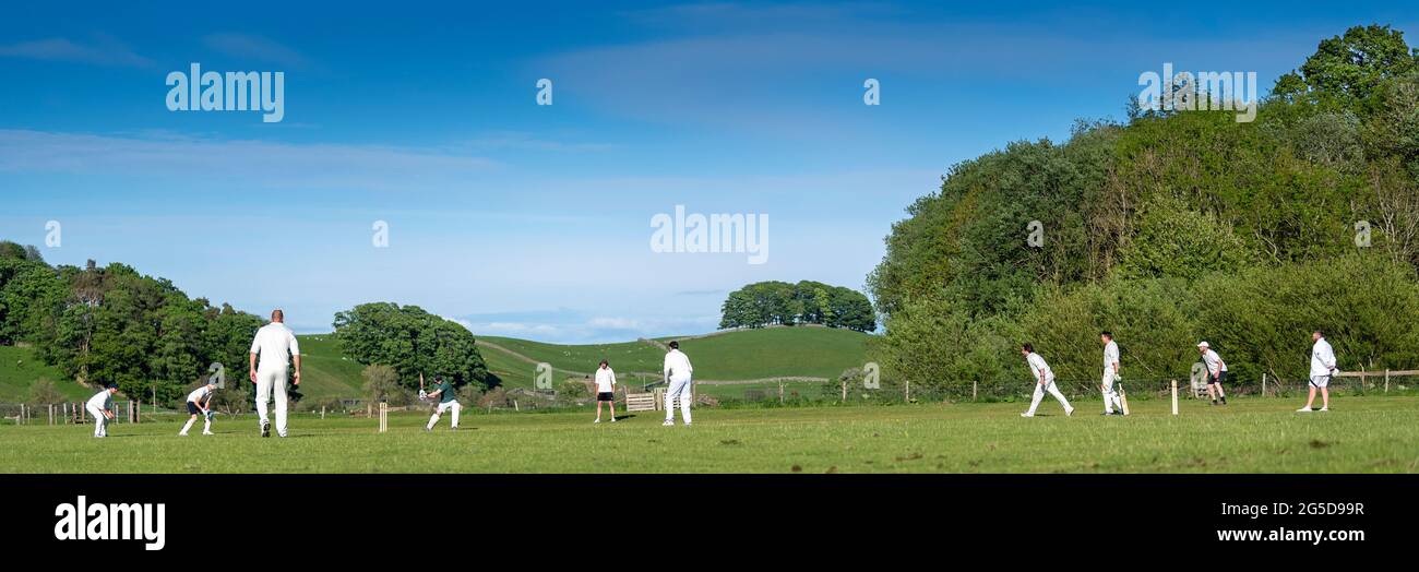 Game of village cricket at Hawes in Wensleydale, North Yorkshire, UK. Stock Photo