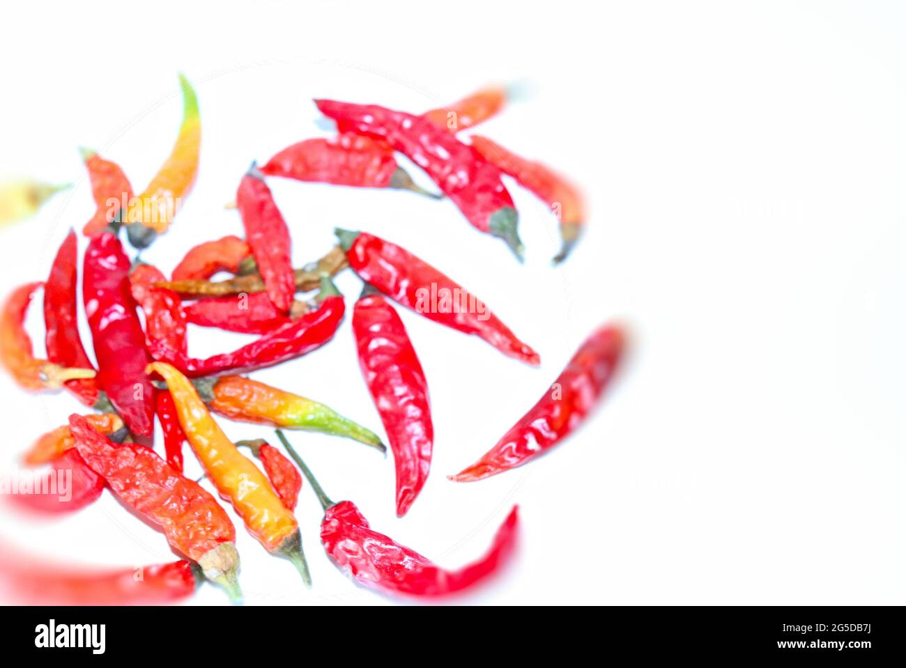 Hot spices, chili pepper aromatic ingredients on a white background