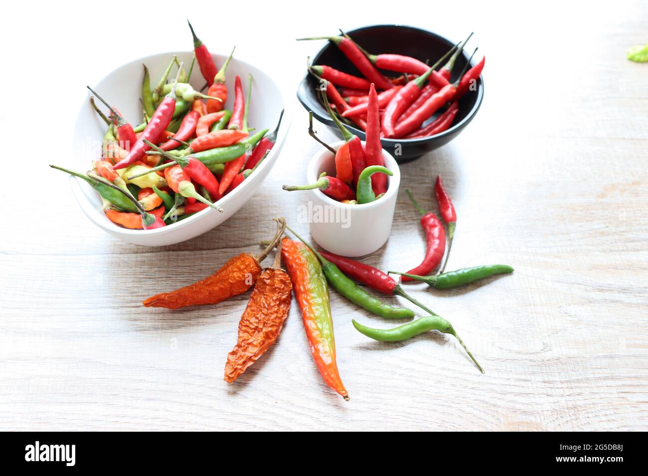 Hot spices, chili pepper aromatic ingredients on a white background
