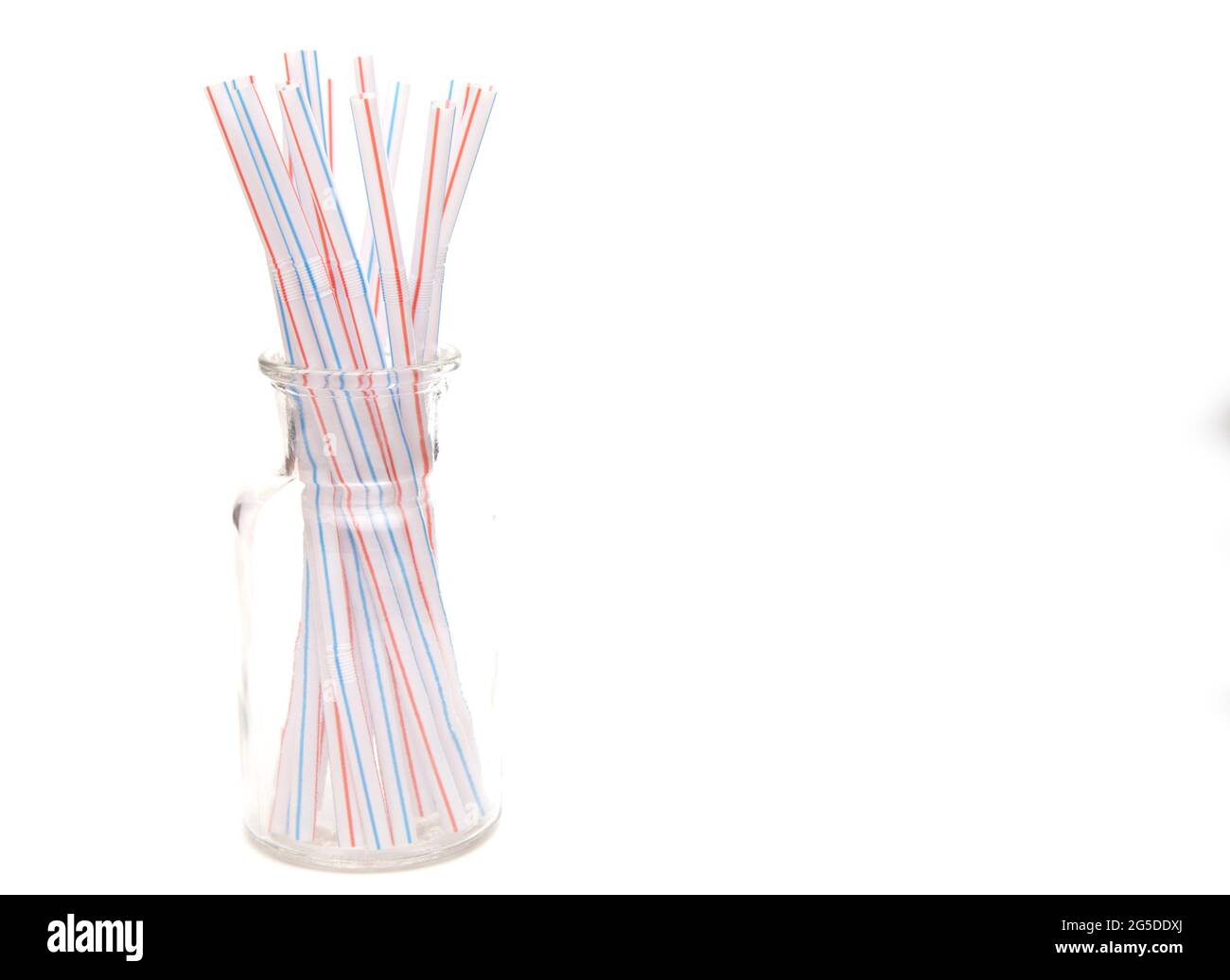Bunch of Straws in a Glass Container on a White Background Stock Photo ...