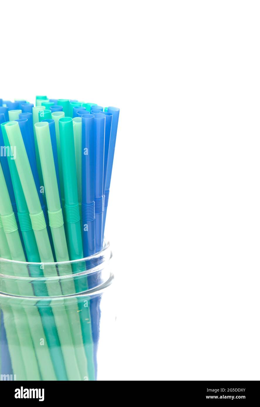 Bunch of Straws in a Glass Container on a White Background Stock Photo ...