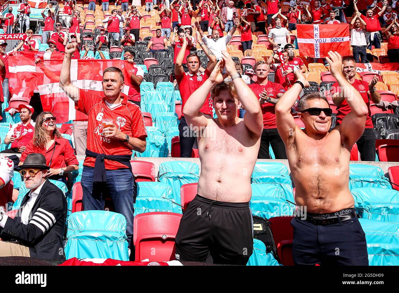 Denmark fans cheer their team during the UEFA Euro 2020 round of 16 match held at the Johan Cruijff ArenA in Amsterdam, Netherlands. Picture date: Saturday June 26, 2021. Stock Photo