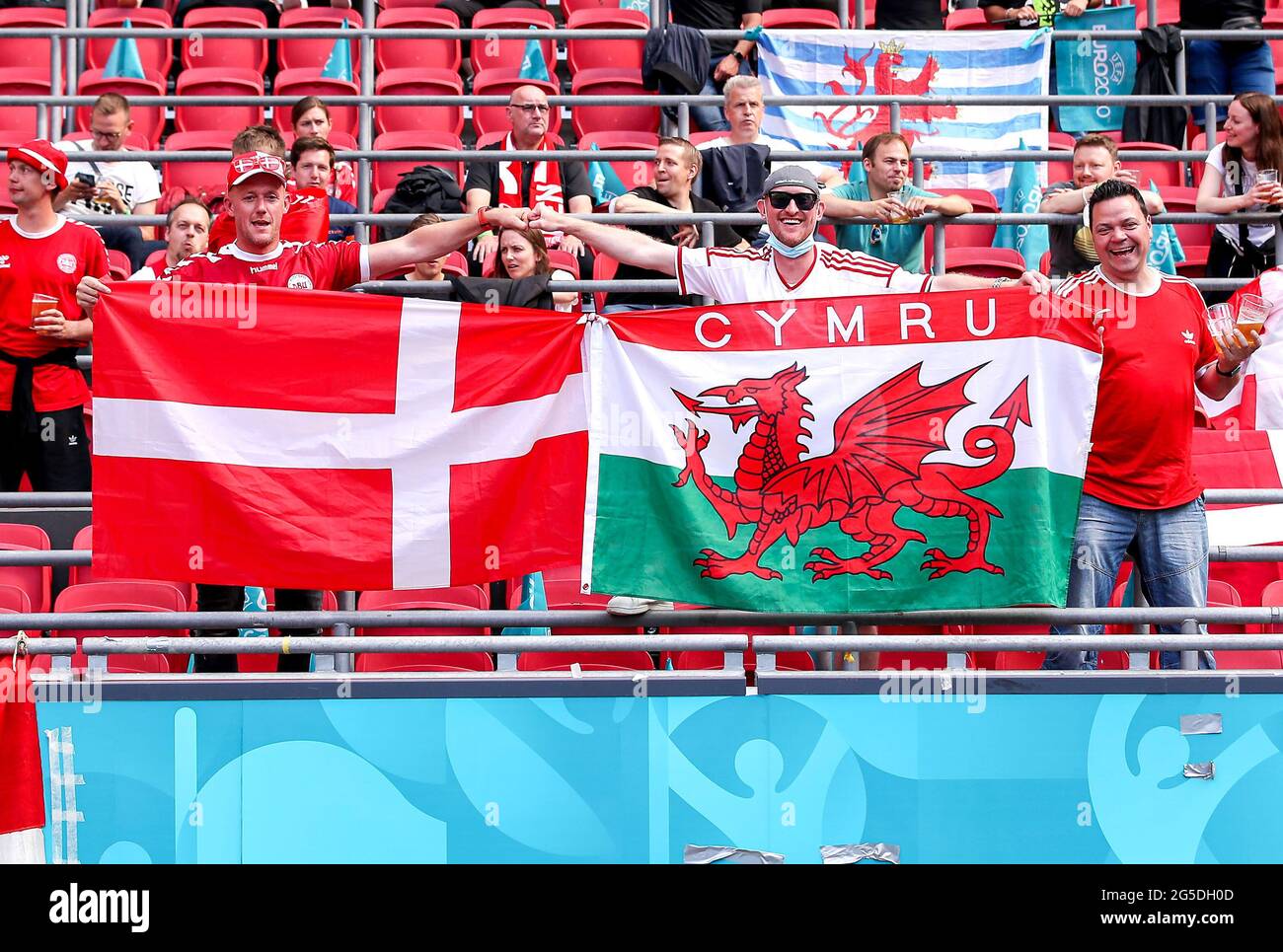 Denmark fans cheer their team during the UEFA Euro 2020 round of 16 match held at the Johan Cruijff ArenA in Amsterdam, Netherlands. Picture date: Saturday June 26, 2021. Stock Photo