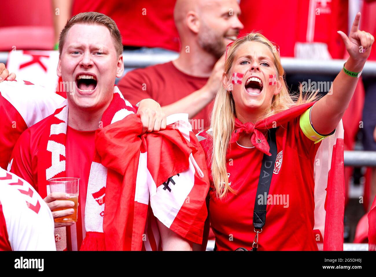 Denmark fans cheer their team during the UEFA Euro 2020 round of 16 match held at the Johan Cruijff ArenA in Amsterdam, Netherlands. Picture date: Saturday June 26, 2021. Stock Photo
