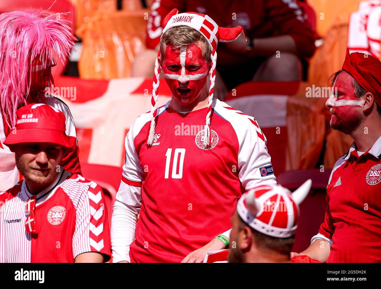 Denmark fans cheer their team during the UEFA Euro 2020 round of 16 match held at the Johan Cruijff ArenA in Amsterdam, Netherlands. Picture date: Saturday June 26, 2021. Stock Photo