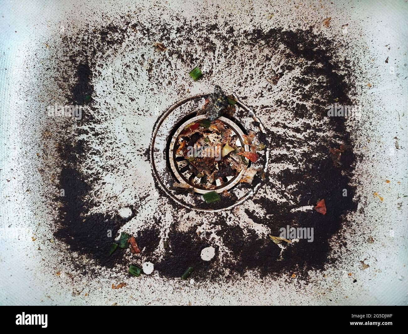 Kitchen sink drain clogged with food waste top view Stock Photo Alamy
