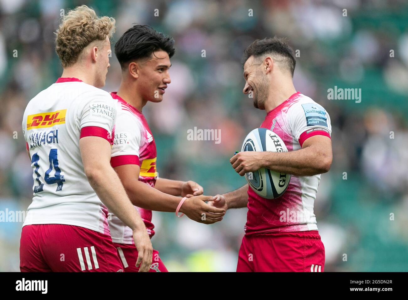 LONDON, UK. JUNE 26TH: Danny Care Marcus Smith and Louis Lynagh of Harlequins celebrates after scoring a try during the Gallagher Premiership match between Exeter Chiefs and Harlequins at Twickenham Stadium, Twickenham on Saturday 26th June 2021. (Credit: Juan Gasparini | MI News) Credit: MI News & Sport /Alamy Live News Stock Photo