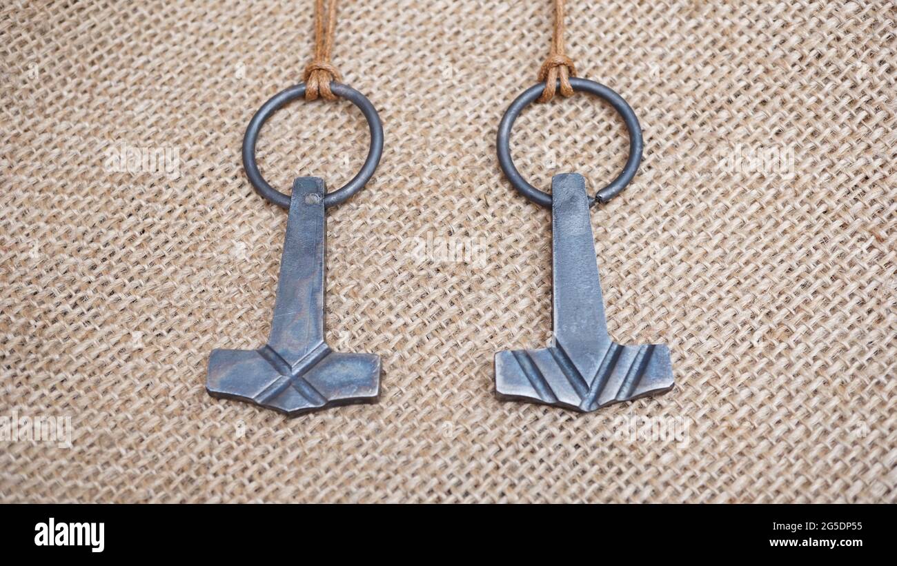 anglo saxon and viking dress items; keys penannular brooch and thor's hammer Stock Photo