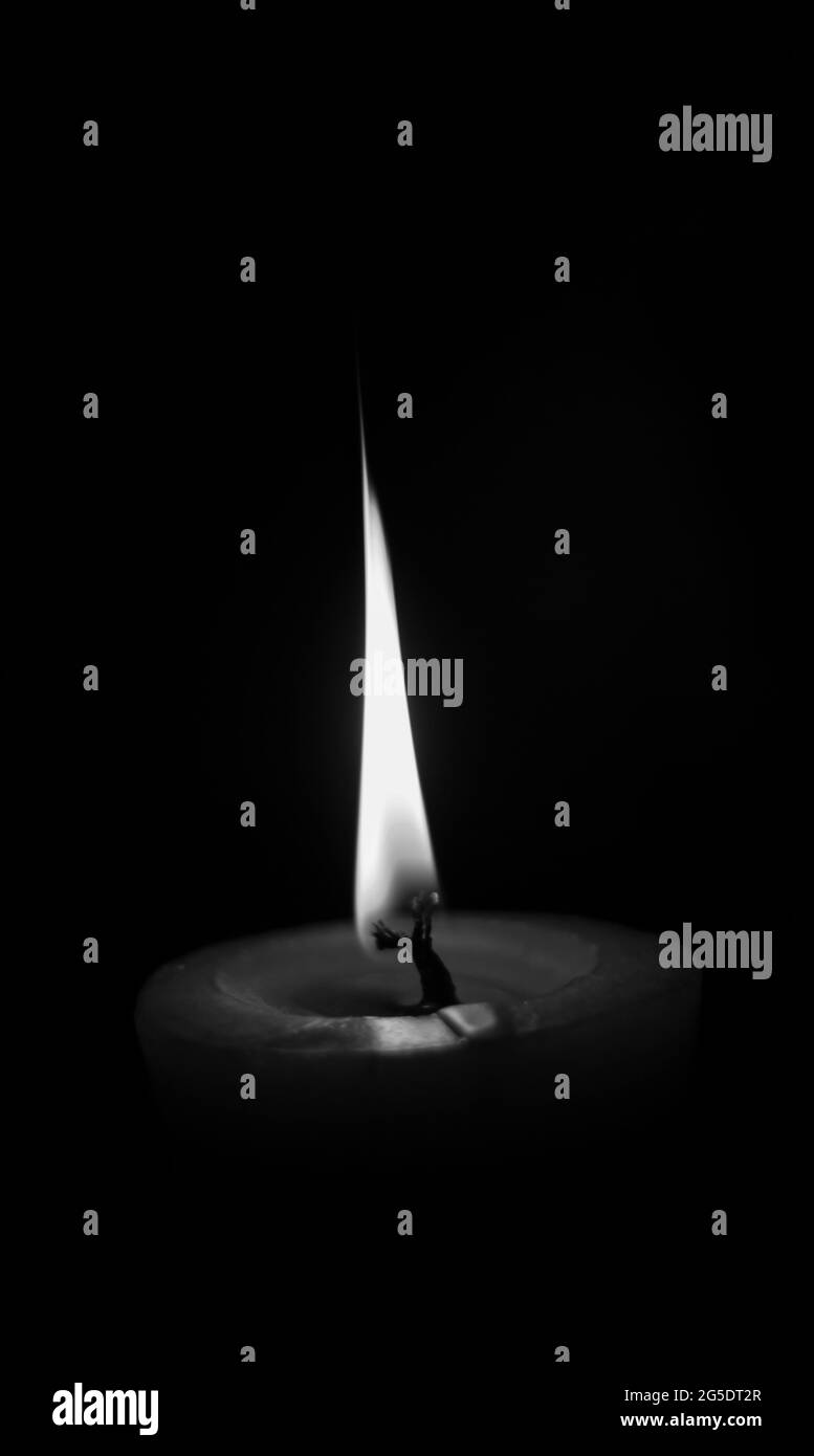 lighting candles, Burning candle on black background, Candle in the