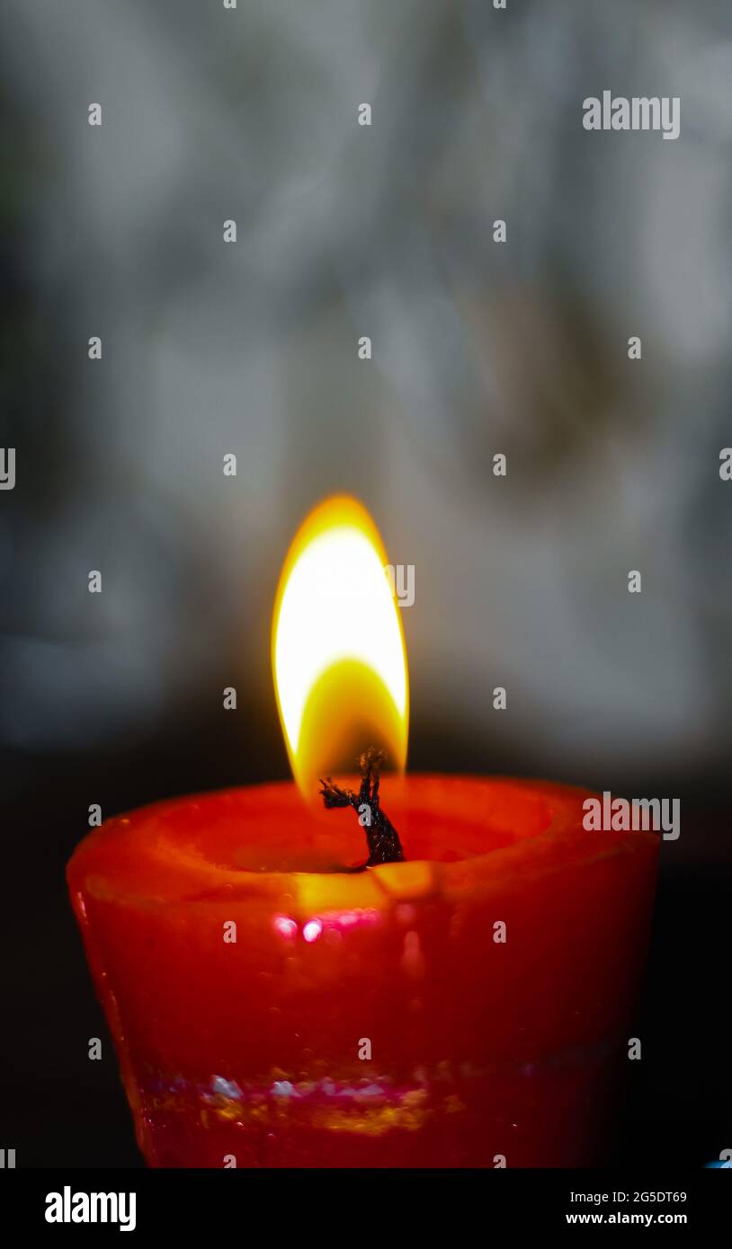 lighting candles, Burning candle on black background, Candle in the dark, Design for the