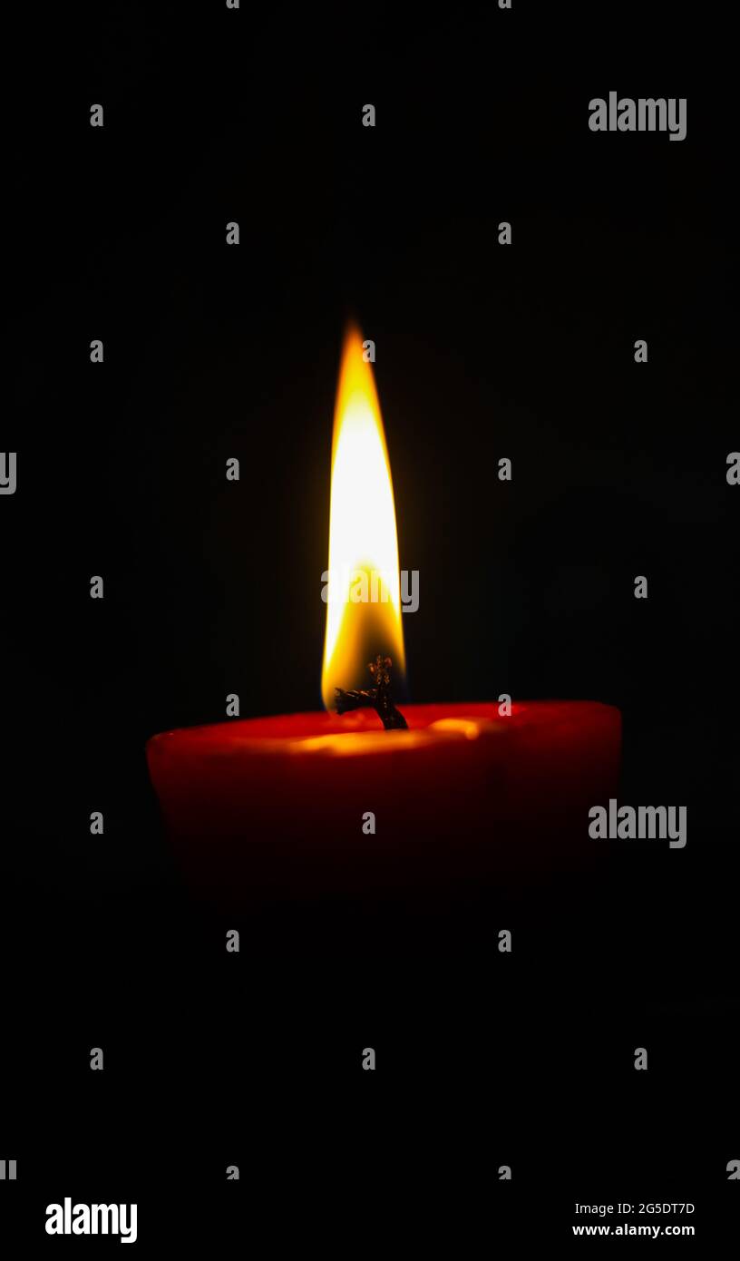 lighting candles, Burning candle on black background, Candle in the dark, Design for the